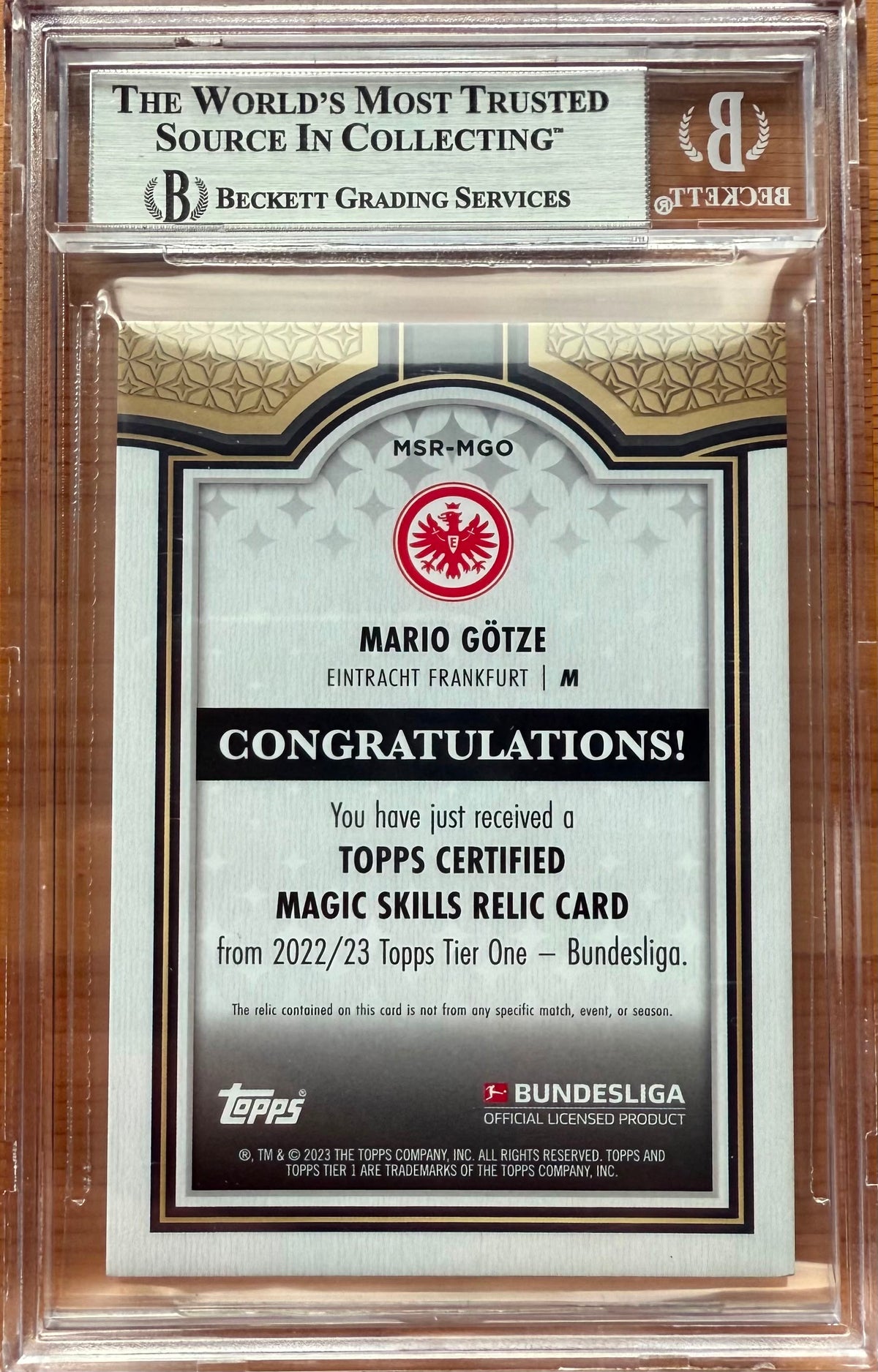 Beckett 8.5 2022-23 TOPPS TIER ONE
BUNDESLIGA
MAGIC SKILLS RELICS #MSRMGO MARIO GOTZE 020/144