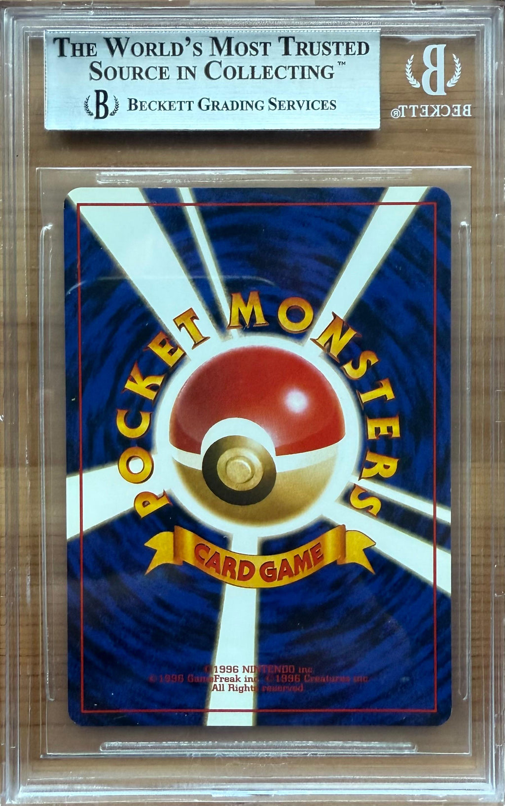 Beckett 8.5  1999 GYM BOOSTER 2
CHALLENGE FROM THE DARKNESS
JAPANESE
TRAINER: GIOVANNI HOLO R